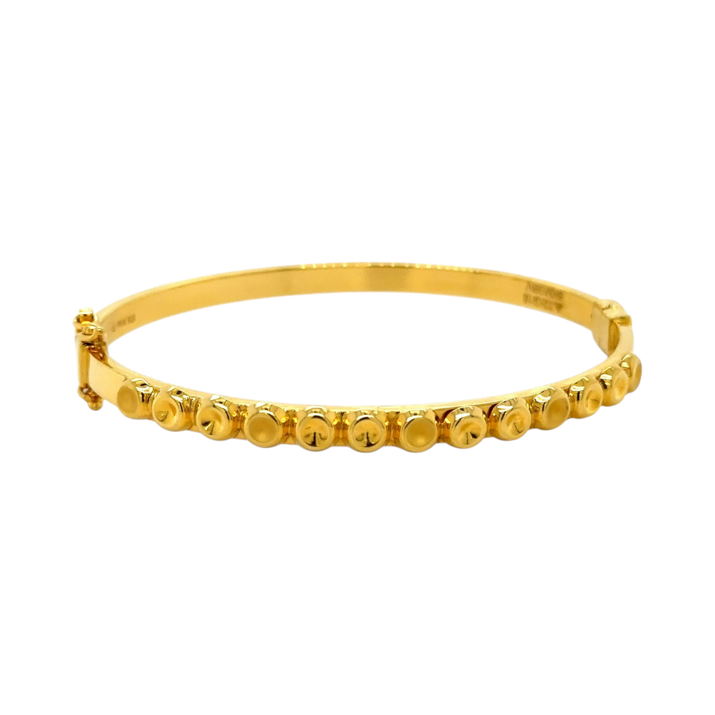 Gold Bracelet with Modern Circular Motif Design